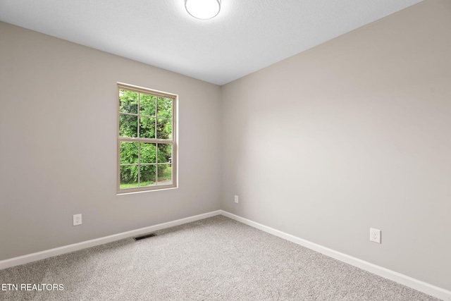 109 Ivy Ln, Oak Ridge, TN 37830 - spare room with baseboards and carpet