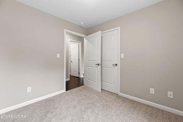 109 Ivy Ln, Oak Ridge, TN 37830 - unfurnished bedroom featuring carpet flooring and baseboards