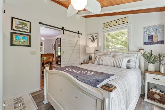 109 Cheeskogili Way, Loudon, TN 37774 - bedroom featuring a barn door, dark wood-type flooring, ceiling fan, crown molding, and wood ceiling with exposed beams