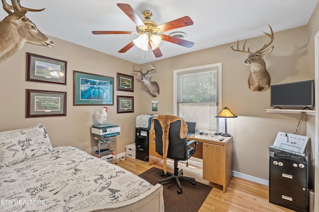109 Cheeskogili Way, Loudon, TN 37774 - bedroom with light wood finished floors, an office area, baseboards, and ceiling fan
