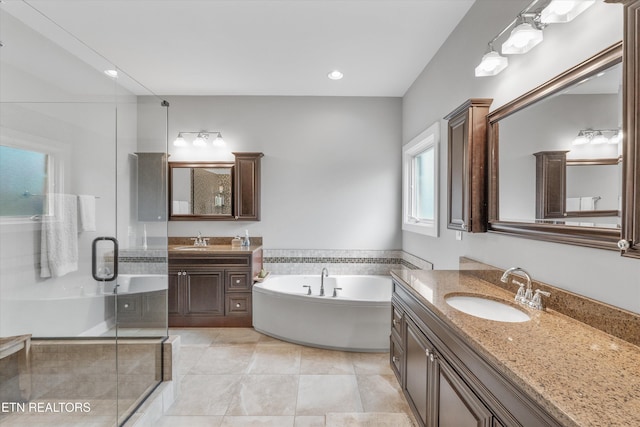 325 Pineberry Dr, Vonore, TN 37885 - bathroom featuring two vanities, a bath, a stall shower, tile patterned floors, and recessed lighting