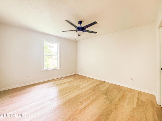 422 Willow Tree Ln, Morristown, TN 37814 - unfurnished room with light wood-type flooring and a ceiling fan