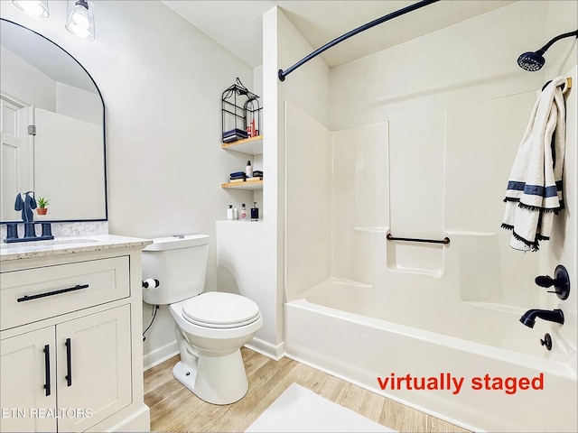 422 Willow Tree Ln, Morristown, TN 37814 - bathroom with wood finished floors, vanity, and shower / bathtub combination