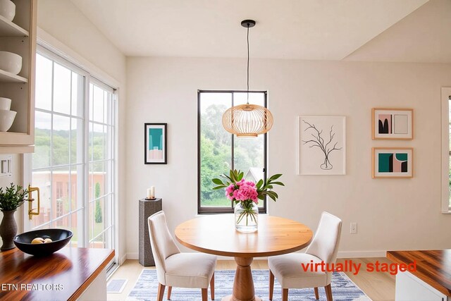 422 Willow Tree Ln, Morristown, TN 37814 - dining area with baseboards and light wood-style floors