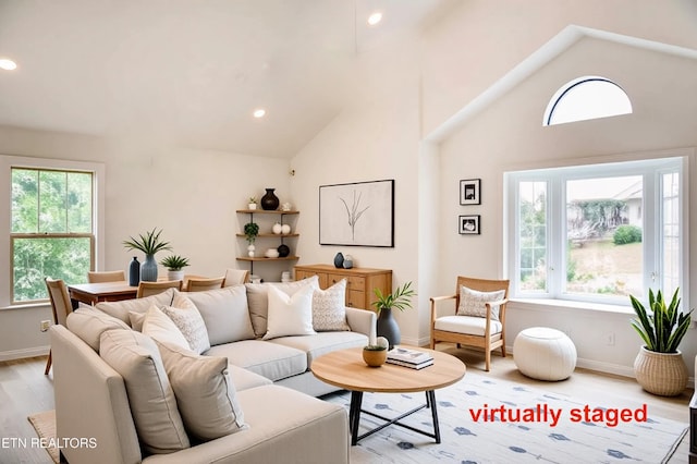 422 Willow Tree Ln, Morristown, TN 37814 - living room with light wood finished floors, recessed lighting, and high vaulted ceiling