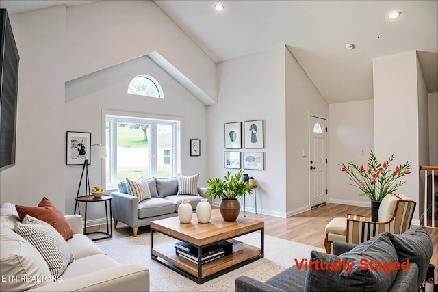 422 Willow Tree Ln, Morristown, TN 37814 - living room with light wood-type flooring, recessed lighting, and high vaulted ceiling