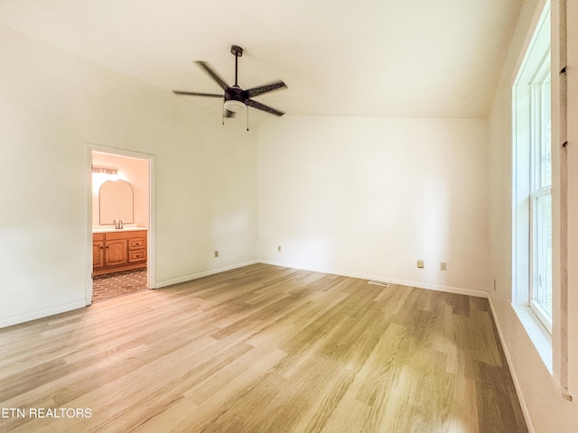 422 Willow Tree Ln, Morristown, TN 37814 - unfurnished bedroom featuring light wood finished floors, vaulted ceiling, ensuite bathroom, and ceiling fan