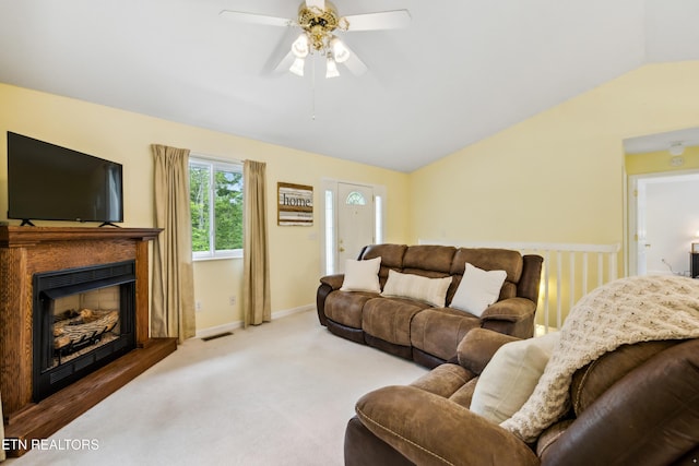 635 Gold Dust Dr, Pigeon Forge, TN 37863 - living room with vaulted ceiling, a ceiling fan, a fireplace, carpet, and baseboards