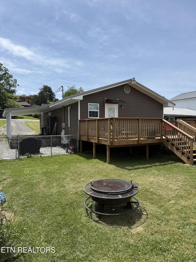321 Coleman St, Harrogate, TN 37752 - back of property featuring a fire pit and a deck