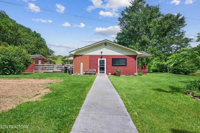 4884 Jones Cove Rd, Cosby, TN 37722 - bungalow featuring a front lawn