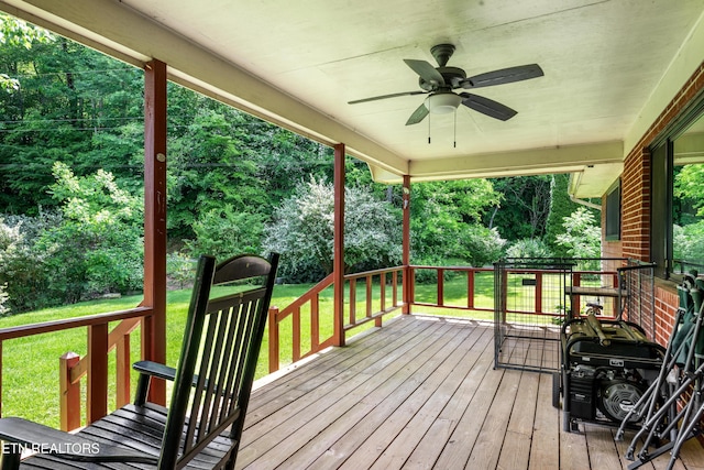 4884 Jones Cove Rd, Cosby, TN 37722 - wooden terrace with ceiling fan and a yard