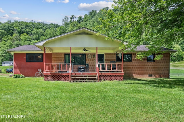 4884 Jones Cove Rd, Cosby, TN 37722 - back of house featuring ceiling fan, a yard, brick siding, and crawl space