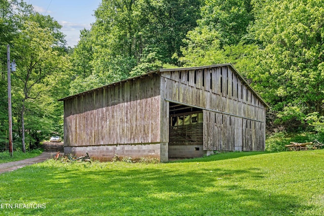 4884 Jones Cove Rd, Cosby, TN 37722 - view of barn with a yard and a view of trees