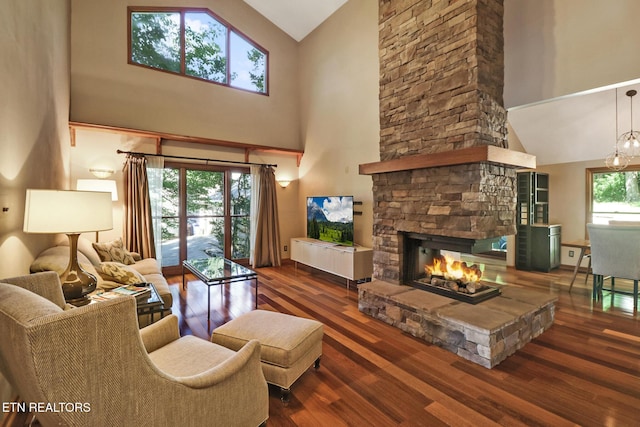 104 Maltese Ln, Oak Ridge, TN 37830 - living room with high vaulted ceiling, wood finished floors, and a fireplace