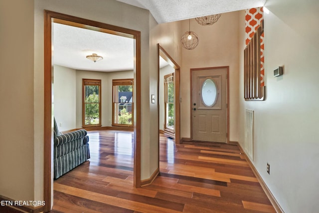 104 Maltese Ln, Oak Ridge, TN 37830 - foyer entrance with wood finished floors, baseboards, and a textured ceiling