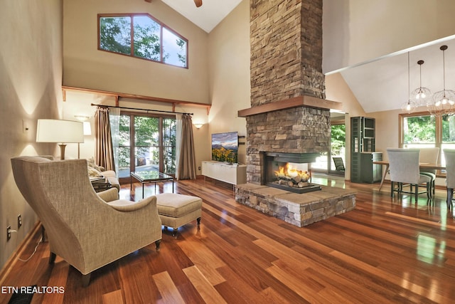 104 Maltese Ln, Oak Ridge, TN 37830 - living area with high vaulted ceiling, a fireplace, wood finished floors, and ceiling fan