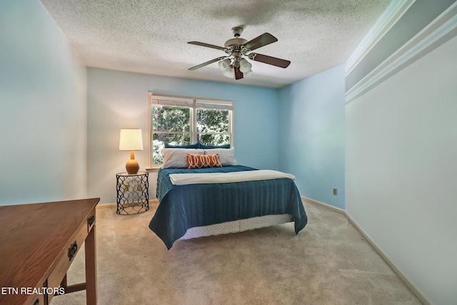 104 Maltese Ln, Oak Ridge, TN 37830 - bedroom featuring carpet flooring, a textured ceiling, ceiling fan, and baseboards