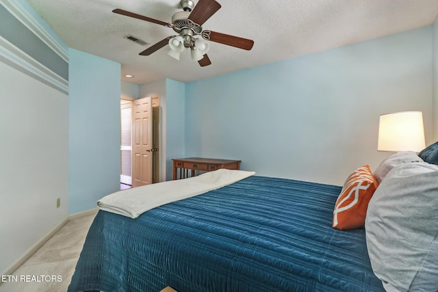 104 Maltese Ln, Oak Ridge, TN 37830 - bedroom with carpet, baseboards, a ceiling fan, and a textured ceiling