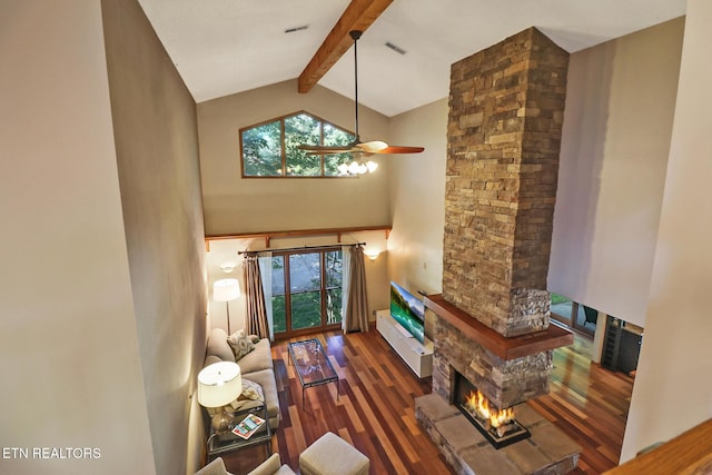 104 Maltese Ln, Oak Ridge, TN 37830 - living area with a stone fireplace, wood finished floors, beamed ceiling, ceiling fan, and plenty of natural light
