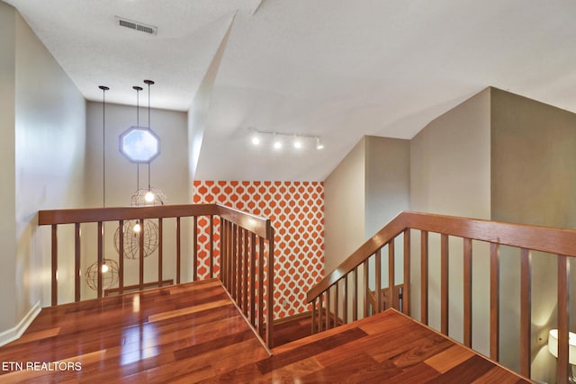 104 Maltese Ln, Oak Ridge, TN 37830 - stairs featuring wood finished floors, track lighting, and baseboards