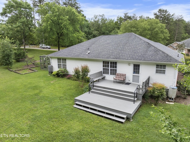 1713 Haley Glenn Ln, Knoxville, TN 37920 - rear view of house with roof with shingles, a lawn, and a wooden deck