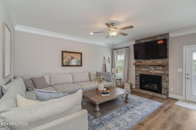 111 Chaseberry Rd, Oak Ridge, TN 37830 - living room featuring ceiling fan, wood finished floors, ornamental molding, and a fireplace