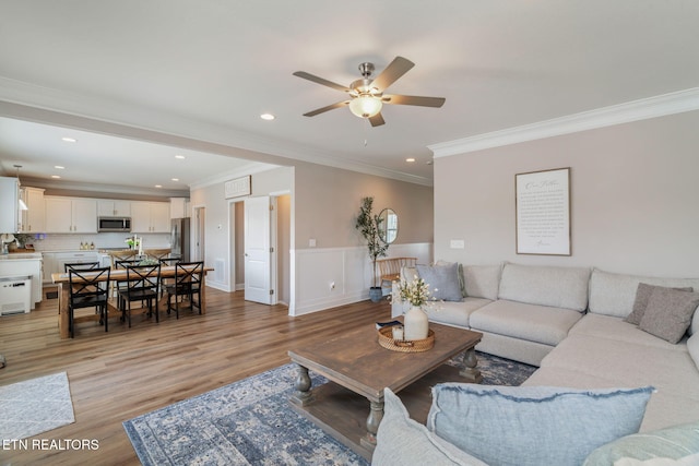 111 Chaseberry Rd, Oak Ridge, TN 37830 - living area with crown molding, a ceiling fan, recessed lighting, light wood finished floors, and wainscoting