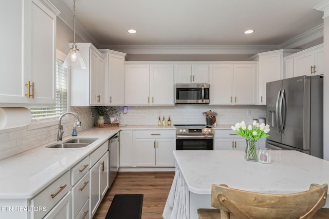 111 Chaseberry Rd, Oak Ridge, TN 37830 - kitchen featuring stainless steel appliances, white cabinets, hanging light fixtures, dark wood-style flooring, and backsplash