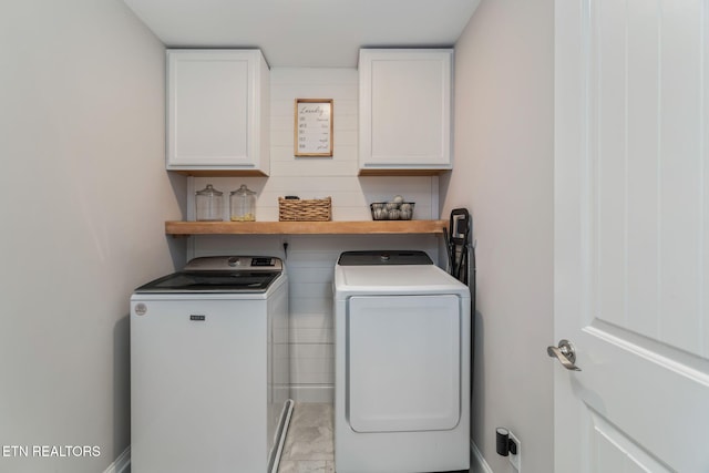 111 Chaseberry Rd, Oak Ridge, TN 37830 - laundry room with cabinet space and washer and clothes dryer