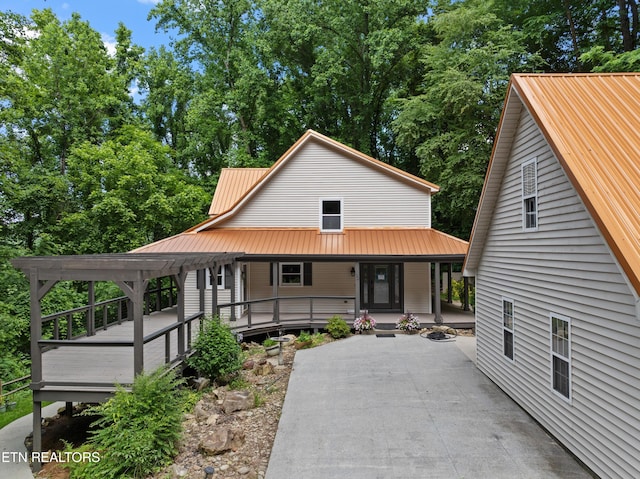 120 Kingdom Ln, Walland, TN 37886 - view of front of home with metal roof and covered porch