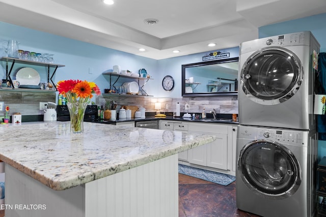 120 Kingdom Ln, Walland, TN 37886 - laundry area with stacked washer / dryer and recessed lighting