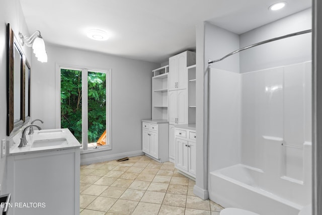 120 Kingdom Ln, Walland, TN 37886 - bathroom featuring vanity,  shower combination, baseboards, and recessed lighting