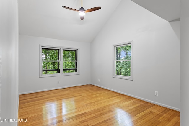 120 Kingdom Ln, Walland, TN 37886 - unfurnished room with plenty of natural light, wood-type flooring, ceiling fan, lofted ceiling, and baseboards