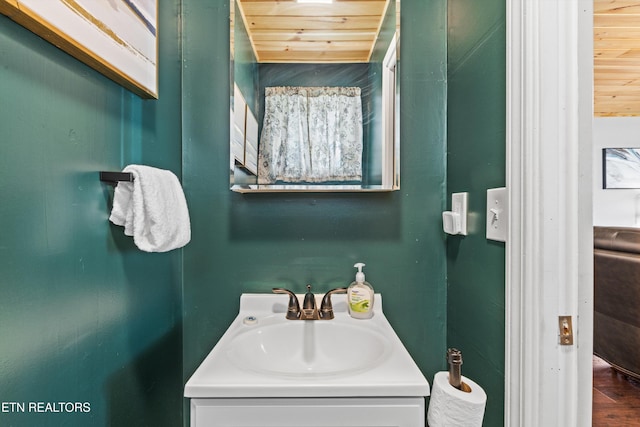 1159 Ditney Ln, Sevierville, TN 37876 - bathroom featuring vanity and wood finished floors
