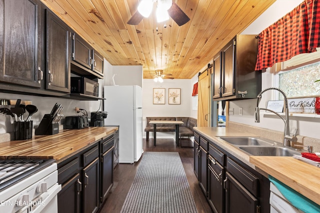 1159 Ditney Ln, Sevierville, TN 37876 - kitchen featuring butcher block countertops, freestanding refrigerator, a ceiling fan, a sink, and wood ceiling