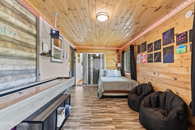 1159 Ditney Ln, Sevierville, TN 37876 - bedroom with wood walls, wood ceiling, and wood finished floors