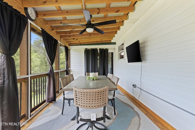 1159 Ditney Ln, Sevierville, TN 37876 - sunroom with outdoor dining area, a ceiling fan, and beam ceiling