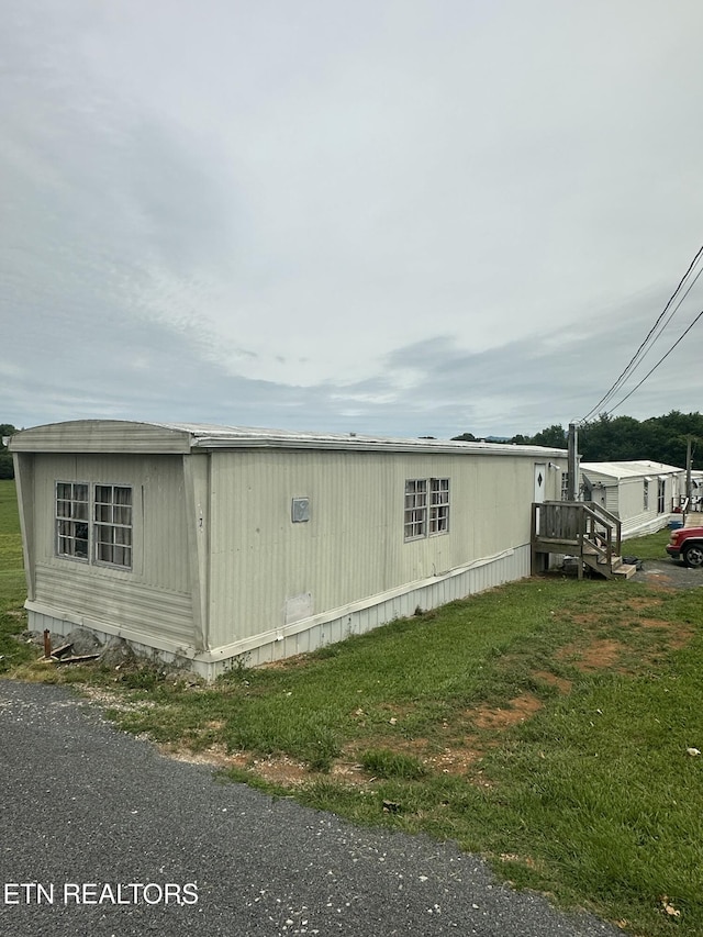 1059 Hale Rd, Dandridge, TN 37725 - view of home's exterior featuring a lawn