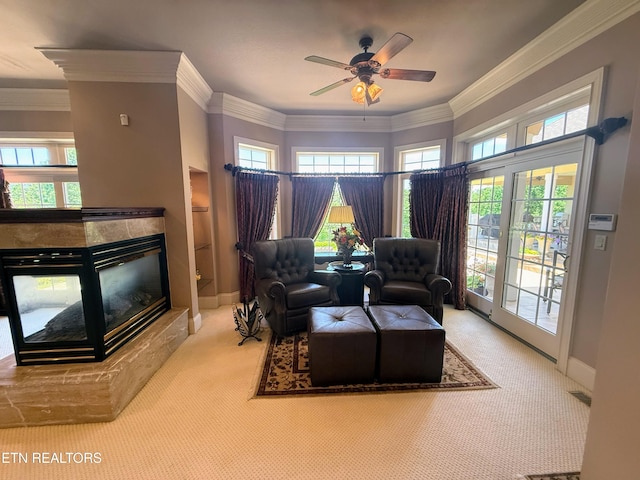 109 Divot Pl, Tazewell, TN 37879 - carpeted living room with a ceiling fan, a tile fireplace, ornamental molding, healthy amount of natural light, and baseboards