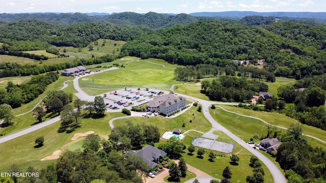 109 Divot Pl, Tazewell, TN 37879 - drone / aerial view of a golf course and a heavily wooded area
