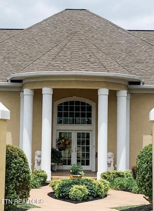 109 Divot Pl, Tazewell, TN 37879 - view of exterior entry with roof with shingles and french doors