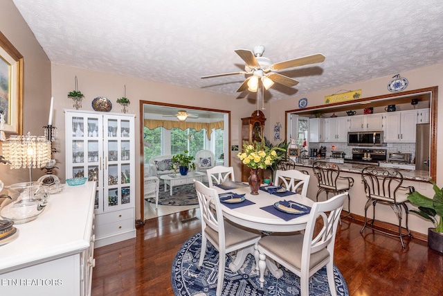 2368 Governors Ct, Maryville, TN 37801 - dining room with dark wood-style flooring, a textured ceiling, and ceiling fan