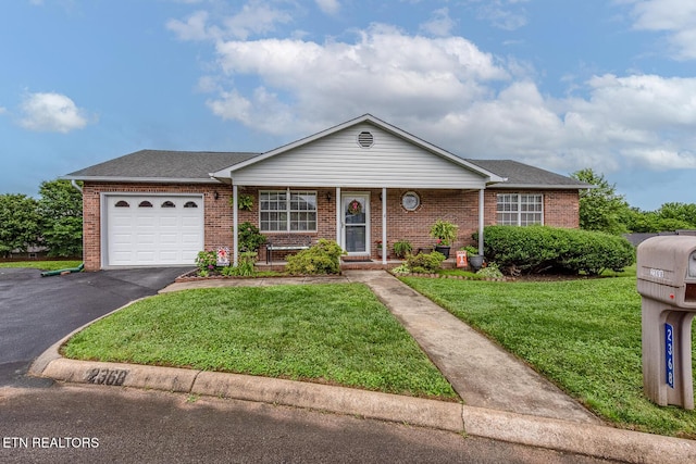 2368 Governors Ct, Maryville, TN 37801 - ranch-style house with brick siding, a garage, asphalt driveway, a front yard, and a shingled roof