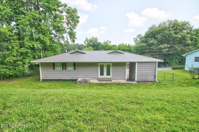 809 Topoca Trl, Athens, TN 37303 - back of house featuring metal roof, a patio, and french doors