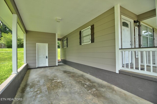 809 Topoca Trl, Athens, TN 37303 - view of patio with an attached carport