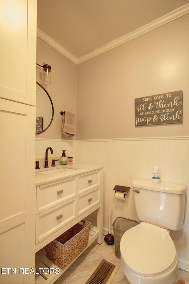 809 Topoca Trl, Athens, TN 37303 - half bathroom featuring vanity, ornamental molding, toilet, and wainscoting