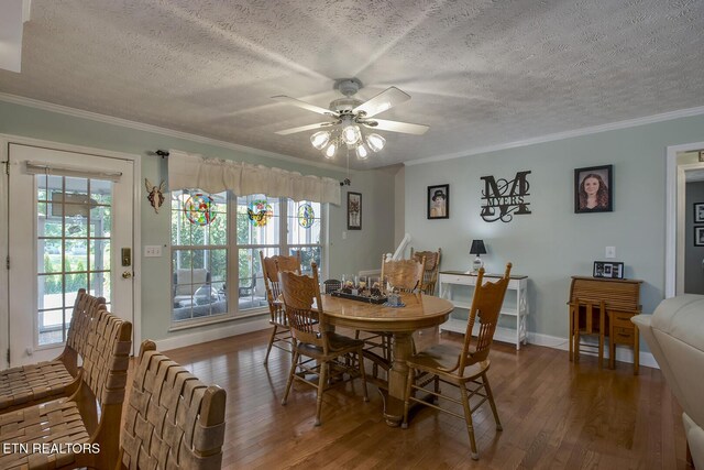 111 Ellis St, Vonore, TN 37885 - dining area featuring a textured ceiling, ornamental molding, wood finished floors, a ceiling fan, and healthy amount of natural light
