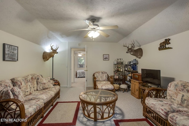 111 Ellis St, Vonore, TN 37885 - living room featuring a textured ceiling, ceiling fan, vaulted ceiling, and light carpet