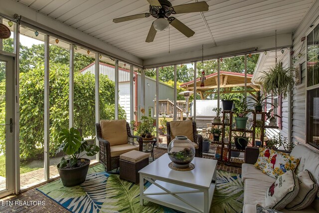 111 Ellis St, Vonore, TN 37885 - sunroom / solarium with ceiling fan and outdoor lounge area