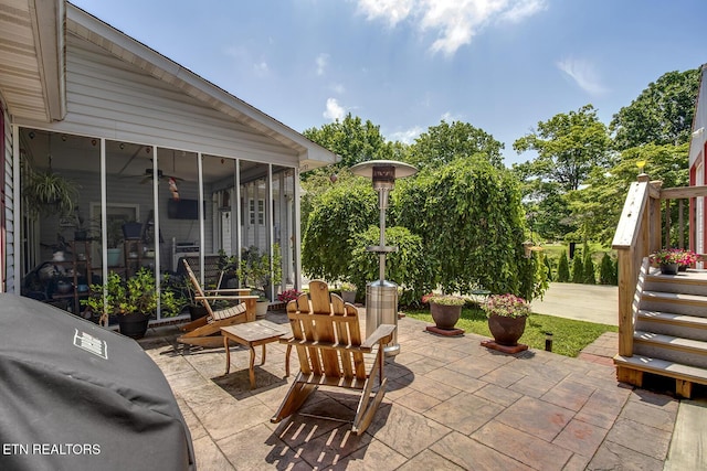 111 Ellis St, Vonore, TN 37885 - view of patio / terrace with a sunroom and a ceiling fan